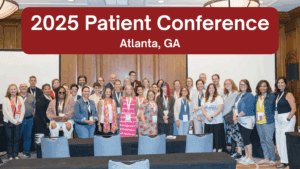 image of a group of people attending a previous patient conference. 